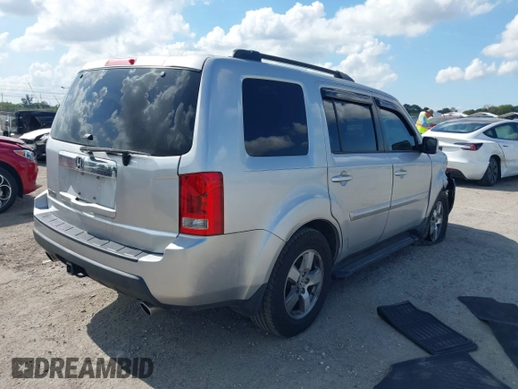 2011 Honda Pilot EX-L with VIN 5FNYF3H63BB014412, listed as a IAAI auction lot 41535137 with 155,100 mi miles and . Bid and sale history available at DreamBid. Image 4.