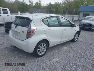 2014 Toyota Prius One with VIN JTDKDTB3XE1065493, listed as a IAAI auction lot 42063832 with 80,440 mi miles and . Bid and sale history available at DreamBid. Image 4.