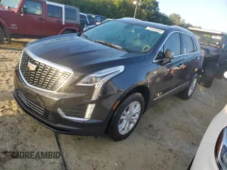 2022 Cadillac XT5 FWD Luxury z VIN 1GYKNAR49NZ159814, wystawiony jako Copart lot #74506584 z przebiegiem 7 069 mil mil oraz Nie do naprawy • Non repairable. Historia ofert i sprzedaży dostępna na DreamBid. Obrazek 1.