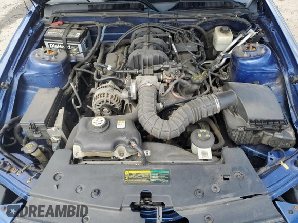 2007 Ford Mustang Deluxe z VIN 1ZVFT80NX75255793, wystawiony jako Copart lot #58993805 z przebiegiem 159 882 mil mil oraz Szkoda całkowita • Salvage title. Historia ofert i sprzedaży dostępna na DreamBid. Obrazek 11.