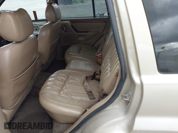 1999 Jeep Grand Cherokee Limited with VIN 1J4GW68SXXC664055, listed as a IAAI auction lot 42339125 with 219,792 mi miles and . Bid and sale history available at DreamBid. Image 8.