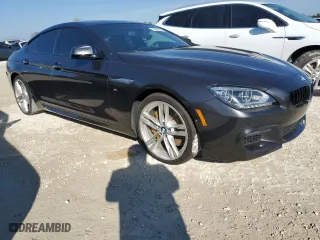 2015 BMW 6 Series 650i with VIN WBA6B2C58FD799063, listed as a Copart auction lot 77819914 with 0 mi miles and Salvage Title. Bid and sale history available at carsss.com. Image 4.