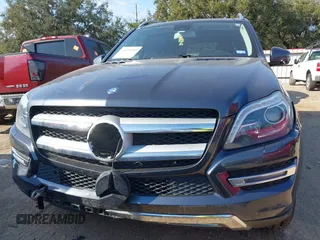 2016 Mercedes-Benz GL with VIN 4JGDF6EE0GA703783, listed as a IAAI auction lot 41696515 with 146,679 mi miles. Bid and sale history available at carsss.com. Image 6.