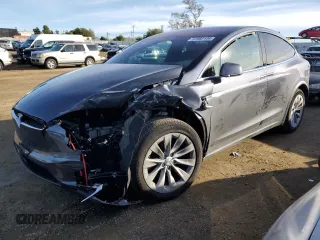 2021 Tesla Model X Long Range Plus with VIN 5YJXCBE27MF324145, listed as a Copart auction lot 87082144 with 35,992 mi miles and Salvage Title. Bid and sale history available at carsss.com. Image 1.