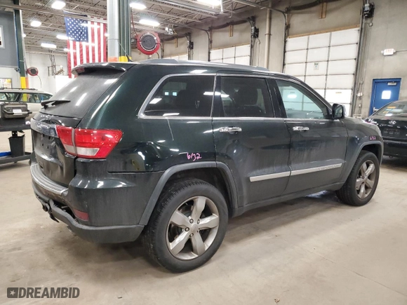 2013 Jeep Grand Cherokee Limited with VIN 1C4RJFBG4DC639455, listed as a Copart auction lot 48300035 with 235,181 mi miles and Salvage Title. Bid and sale history available at carsss.com. Image 3.