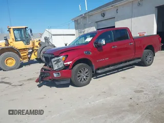 2016 Nissan Titan SL z VIN 1N6BA1F44GN503563, wystawiony jako IAAI lot #41977780 z przebiegiem 126 050 mil mil oraz . Historia ofert i sprzedaży dostępna na DreamBid. Obrazek 2.
