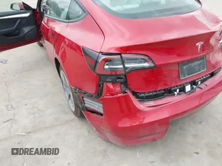 2023 Tesla Model 3 z VIN 5YJ3E1EA4PF384642, wystawiony jako IAAI lot #41496074 z przebiegiem 10 860 mil mil oraz . Historia ofert i sprzedaży dostępna na DreamBid. Obrazek 6.