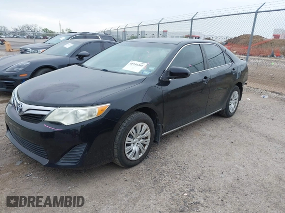 2014 Toyota Camry L with VIN 4T4BF1FK2ER390414, listed as a IAAI auction lot 41936368 with 164,811 mi miles and . Bid and sale history available at DreamBid. Image 17.