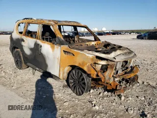 2016 Infiniti QX80 with VIN JN8AZ2NE1G9122953, listed as a Copart auction lot 71239384 with 0 mi miles and Salvage Title. Bid and sale history available at carsss.com. Image 4.