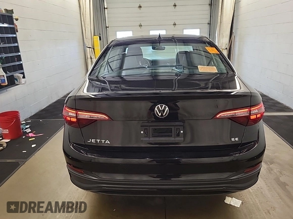 2023 Volkswagen Jetta SE with VIN 3VWEM7BUXPM009957, listed as a IAAI auction lot 42805780 with 2,429 mi miles and . Bid and sale history available at DreamBid. Image 4.