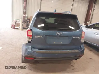2018 Subaru Forester Premium with VIN JF2SJGECXJH606668, listed as a IAAI auction lot 41879710 with 64,910 mi miles. Bid and sale history available at carsss.com. Image 16.