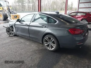 2018 BMW 4 Series 430i xDrive with VIN WBA4J3C57JBG95638, listed as a IAAI auction lot 41960833 with 108,504 mi miles and . Bid and sale history available at DreamBid. Image 3.