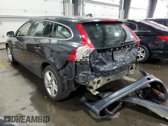 2015 Volvo V60 T5 Drive-E Premier z VIN YV140MEK4F1261731, wystawiony jako Copart lot #65625862 z przebiegiem 118 842 mil mil oraz . Historia ofert i sprzedaży dostępna na DreamBid. Obrazek 3.