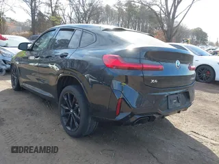 2022 BMW X4 M40i with VIN 5UX43DT0XN9L33898, listed as a IAAI auction lot 41642374 with 8 mi miles and . Bid and sale history available at DreamBid. Image 3.