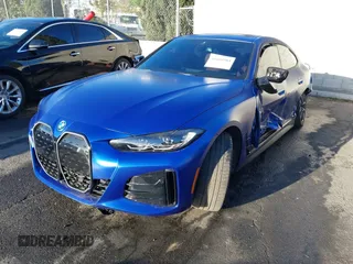 2024 BMW i4 eDrive40 with VIN WBY73AW07RFS43770, listed as a IAAI auction lot 41689504 with 14,684 mi miles. Bid and sale history available at carsss.com. Image 21.