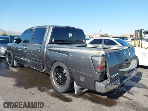 2004 Nissan Titan LE with VIN 1N6AA07A14N541998, listed as a IAAI auction lot 42304039 with 189,533 mi miles and . Bid and sale history available at DreamBid. Image 3.