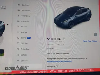 2024 Tesla Model Y Long Range with VIN 7SAYGDEE8RA293641, listed as a IAAI auction lot 41891018 with 7,341 mi miles and . Bid and sale history available at DreamBid. Image 7.