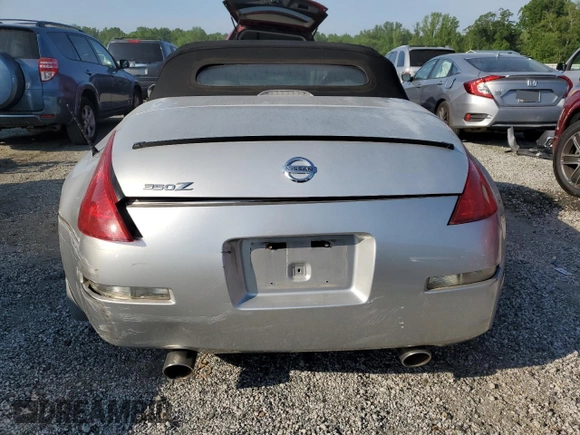 2005 Nissan 350Z Touring z VIN JN1AZ36A95M751810, wystawiony jako Copart lot #55104085 z przebiegiem 99 278 mil mil oraz Szkoda całkowita • Salvage title. Historia ofert i sprzedaży dostępna na DreamBid. Obrazek 6.