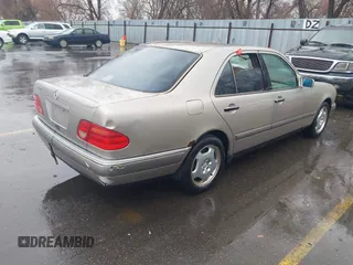 1997 Mercedes-Benz E-Class with VIN WDBJF72F0VA323171, listed as a IAAI auction lot 41739952 with 1 mi miles. Bid and sale history available at carsss.com. Image 4.