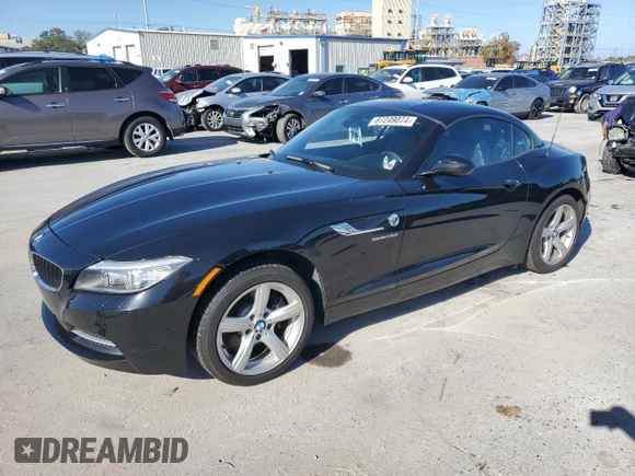 2015 BMW Z4 sDrive28i with VIN WBALL5C54FP557726, listed as a Copart auction lot 87249074 with 64,856 mi miles and Salvage Title. Bid and sale history available at carsss.com. Image 1.