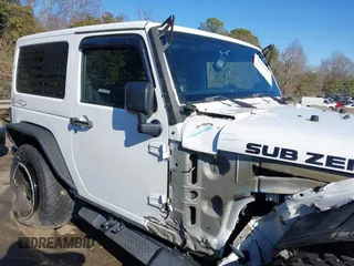 2014 Jeep Wrangler Sport with VIN 1C4AJWAG0EL245337, listed as a IAAI auction lot 41532314 with 140,721 mi miles and . Bid and sale history available at DreamBid. Image 13.