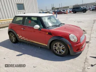2013 MINI Hardtop with VIN WMWSU3C56DT545546, listed as a Copart auction lot 50413305 with 103,305 mi miles and Salvage Title. Bid and sale history available at DreamBid. Image 4.