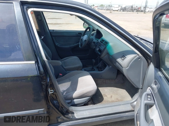 1999 Honda Civic LX with VIN JHMEJ6674XS003829, listed as a IAAI auction lot 42121298 with 238,936 mi miles. Bid and sale history available at carsss.com. Image 5.