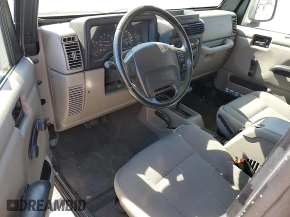 2004 Jeep Wrangler Sahara with VIN 1J4FA59SX4P718591, listed as a Copart auction lot 59907805 with 241,994 mi miles and Clean title. Bid and sale history available at DreamBid. Image 8.