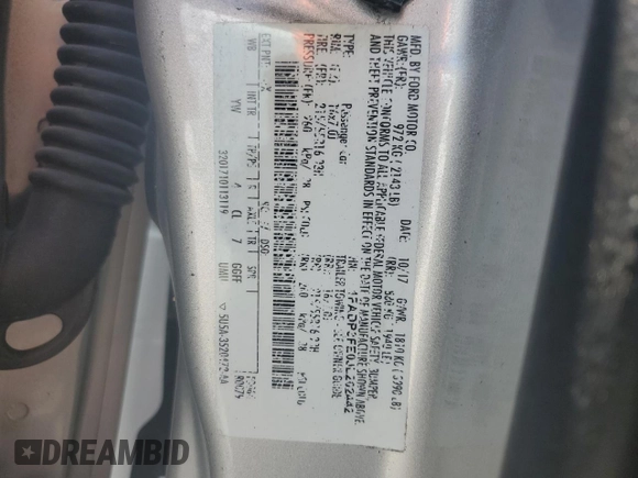 2018 Ford Focus SE with VIN 1FADP3FE0JL202442, listed as a Copart auction lot 53468725 with 106,119 mi miles and Salvage title. Bid and sale history available at DreamBid. Image 14.