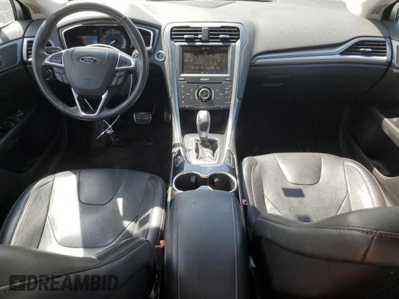 2014 Ford Fusion Titanium с VIN 3FA6P0K97ER293233, выставлен на аукционе Copart как лот 54256985 с пробегом 111 854 миль миль и Списание • Salvage title. История ставок и продаж доступна на DreamBid. Изображение 8.