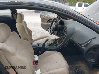 1997 Mitsubishi Eclipse with VIN 4A3AK44Y1VE042951, listed as a IAAI auction lot 42103920 with 119,268 mi miles and . Bid and sale history available at DreamBid. Image 5.