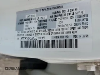 2021 Mazda CX-9 Touring with VIN JM3TCBCY4M0524573, listed as a Copart auction lot 60961165 with 58,408 mi miles and Salvage title. Bid and sale history available at DreamBid. Image 13.
