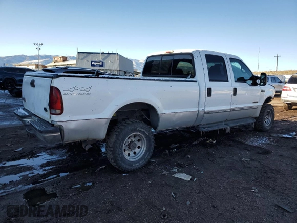 2000 Ford F-350 XL with VIN 1FTSW31F8YEA82117, listed as a Copart auction lot 82800154 with 236,161 mi miles and Salvage Title. Bid and sale history available at DreamBid. Image 3.