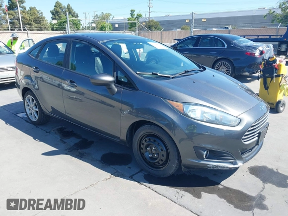 2019 Ford Fiesta SE z VIN 3FADP4BJ2KM131012, wystawiony jako IAAI lot #42228822 z przebiegiem 100 460 mil mil oraz . Historia ofert i sprzedaży dostępna na DreamBid. Obrazek 1.