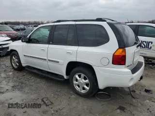 2004 GMC Envoy SLT with VIN 1GKDT13SX42404837, listed as a Copart auction lot 84515994 with 184,153 mi miles and Salvage Title. Bid and sale history available at carsss.com. Image 2.