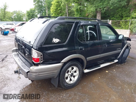 2003 Isuzu Rodeo with VIN 4S2DM58W234312253, listed as a IAAI auction lot 42319453 with 187,939 mi miles and . Bid and sale history available at DreamBid. Image 4.