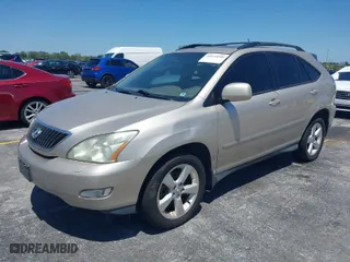2005 Lexus RX 330 with VIN 2T2HA31U05C059173, listed as a IAAI auction lot 42039940 with 165,393 mi miles. Bid and sale history available at carsss.com. Image 2.