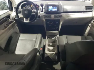 2011 Volkswagen Routan SE with VIN 2V4RW3DG2BR738704, listed as a Copart auction lot 58767625 with 116,886 mi miles and Salvage title. Bid and sale history available at DreamBid. Image 8.
