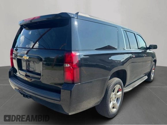2016 Chevrolet Suburban LT with VIN 1GNSKHKC0GR14614, listed as a Copart auction lot 65295535 with 215,675 mi miles and Clean title. Bid and sale history available at DreamBid. Image 4.