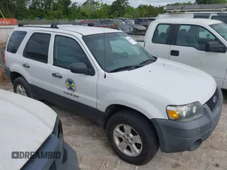 2006 Ford Escape XLT with VIN 1FMYU93196KC72975, listed as a IAAI auction lot 42088686 with 75,440 mi miles and . Bid and sale history available at DreamBid. Image 1.
