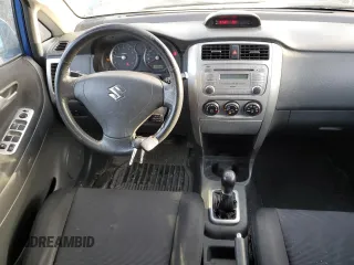 2005 Suzuki Aerio SX z VIN JS2RC61H655300809, wystawiony jako Copart lot #42507415 z przebiegiem 273 937 mil mil oraz Szkoda całkowita • Salvage title. Historia ofert i sprzedaży dostępna na DreamBid. Obrazek 8.
