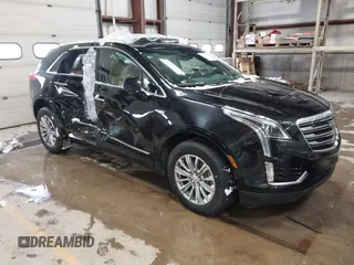2019 Cadillac XT5 Luxury AWD z VIN 1GYKNDRS4KZ107678, wystawiony jako IAAI lot #41390619 z przebiegiem 72 011 mil mil oraz . Historia ofert i sprzedaży dostępna na DreamBid. Obrazek 1.