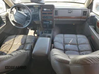 1995 Jeep Grand Cherokee Limited z VIN 1J4GZ78S0SC575083, wystawiony jako Copart lot #61047975 z przebiegiem 205 407 mil mil oraz Czysty tytuł • Clean title. Historia ofert i sprzedaży dostępna na DreamBid. Obrazek 8.