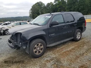 2009 GMC Yukon SLE w/3SA with VIN 1GKFC23C39J100821, listed as a Copart auction lot 72086384 with 171,784 mi miles and Salvage Title. Bid and sale history available at carsss.com. Image 1.