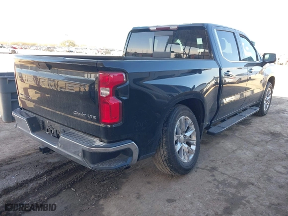 2019 Chevrolet Silverado 1500 LTZ with VIN 1GCPWEED4KZ102552, listed as a IAAI auction lot 41479603 with 104,913 mi miles. Bid and sale history available at carsss.com. Image 4.