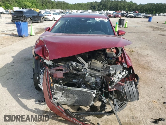 2024 Mazda 3 S Preferred with VIN JM1BPALM2R1652795, listed as a Copart auction lot 57056355 with 12,100 mi miles and Salvage title. Bid and sale history available at DreamBid. Image 5.
