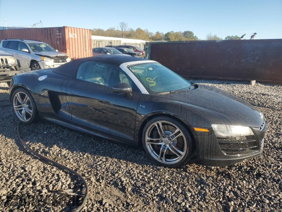 2011 Audi R8 z VIN WUAVNAFG5BN000537, wystawiony jako Copart lot #79313334 z przebiegiem Nie podano mil oraz Szkody całkowita. Historia ofert i sprzedaży dostępna na DreamBid. Obrazek 4.