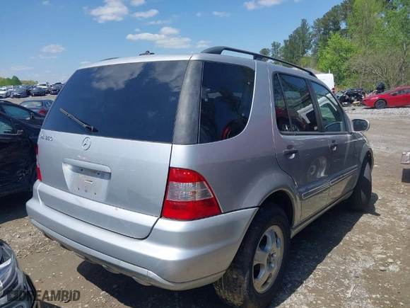 2004 Mercedes-Benz M-Class 3.5L with VIN 4JGAB57E34A499577, listed as a IAAI auction lot 41997422 with 117,623 mi miles. Bid and sale history available at carsss.com. Image 4.