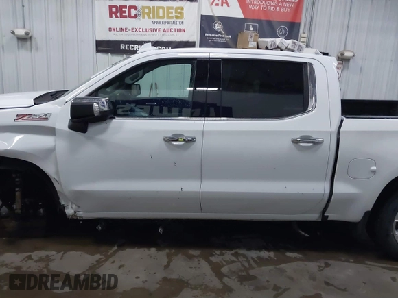 2021 Chevrolet Silverado 1500 LTZ with VIN 3GCUYGED5MG406503, listed as a IAAI auction lot 41293078 with 63,439 mi miles and . Bid and sale history available at DreamBid. Image 14.