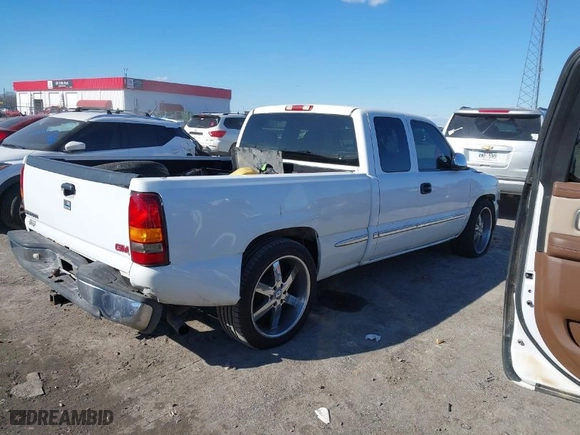 2000 GMC Sierra 1500 SLT with VIN 1GTEC19T6YZ129383, listed as a IAAI auction lot 41316141 with 187,146 mi miles. Bid and sale history available at carsss.com. Image 4.